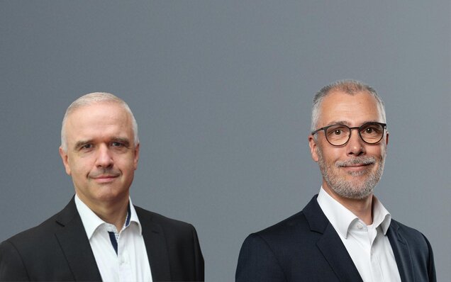 Porträt zweier Mitarbeiter von BKS im Anzug - Roberto Creutziger und Dirk Wellsow